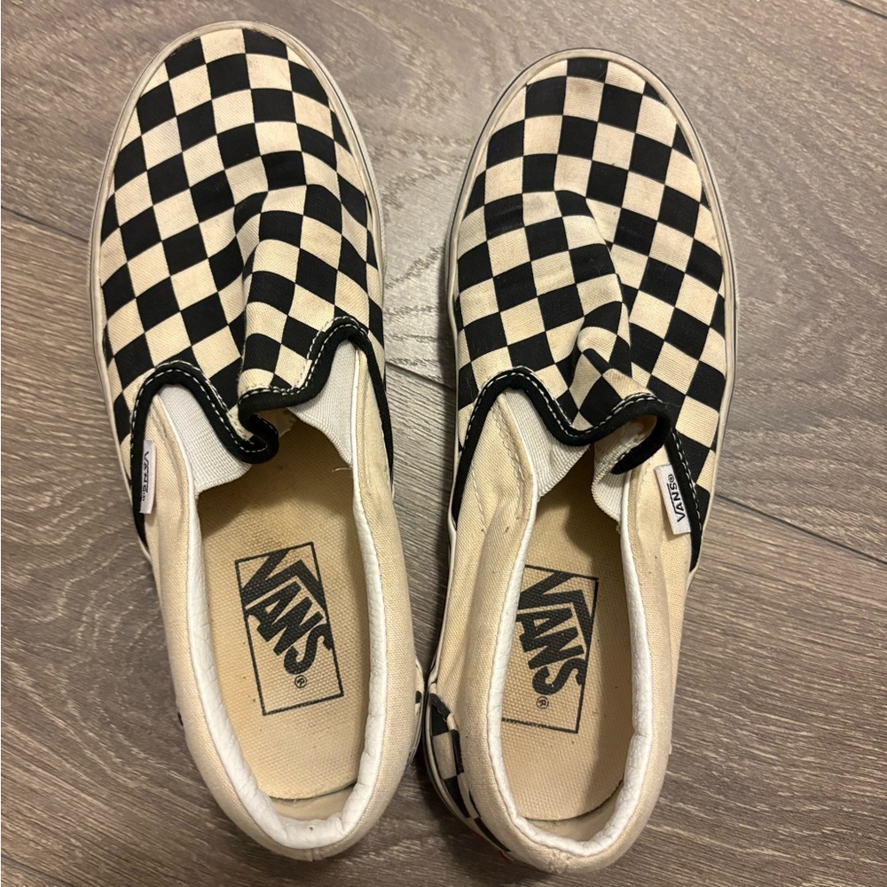 Well worn vans slip on shoes